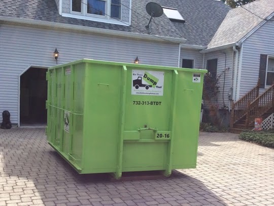 Our dumpster on driveway protection boards